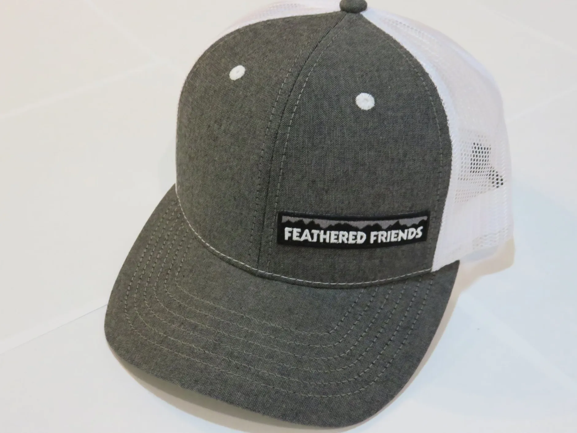 Feathered Friends Pro Style Trucker Offset Mountain Logo Patch Hat