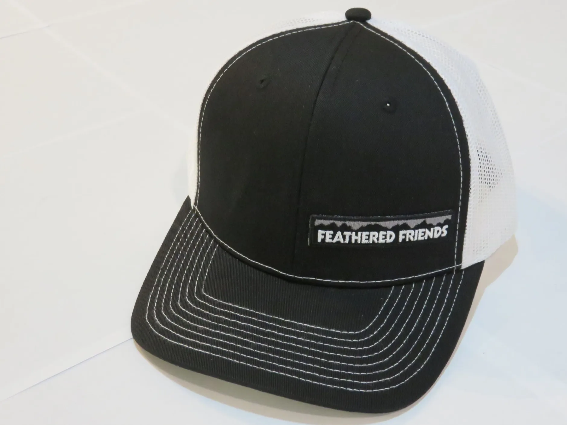 Feathered Friends Pro Style Trucker Offset Mountain Logo Patch Hat