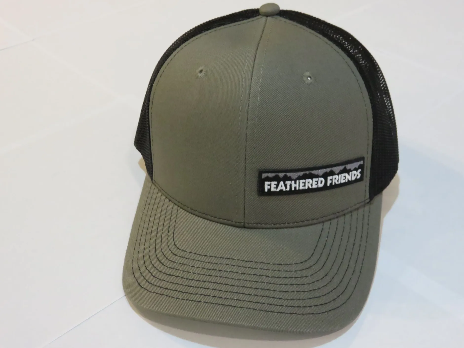 Feathered Friends Pro Style Trucker Offset Mountain Logo Patch Hat