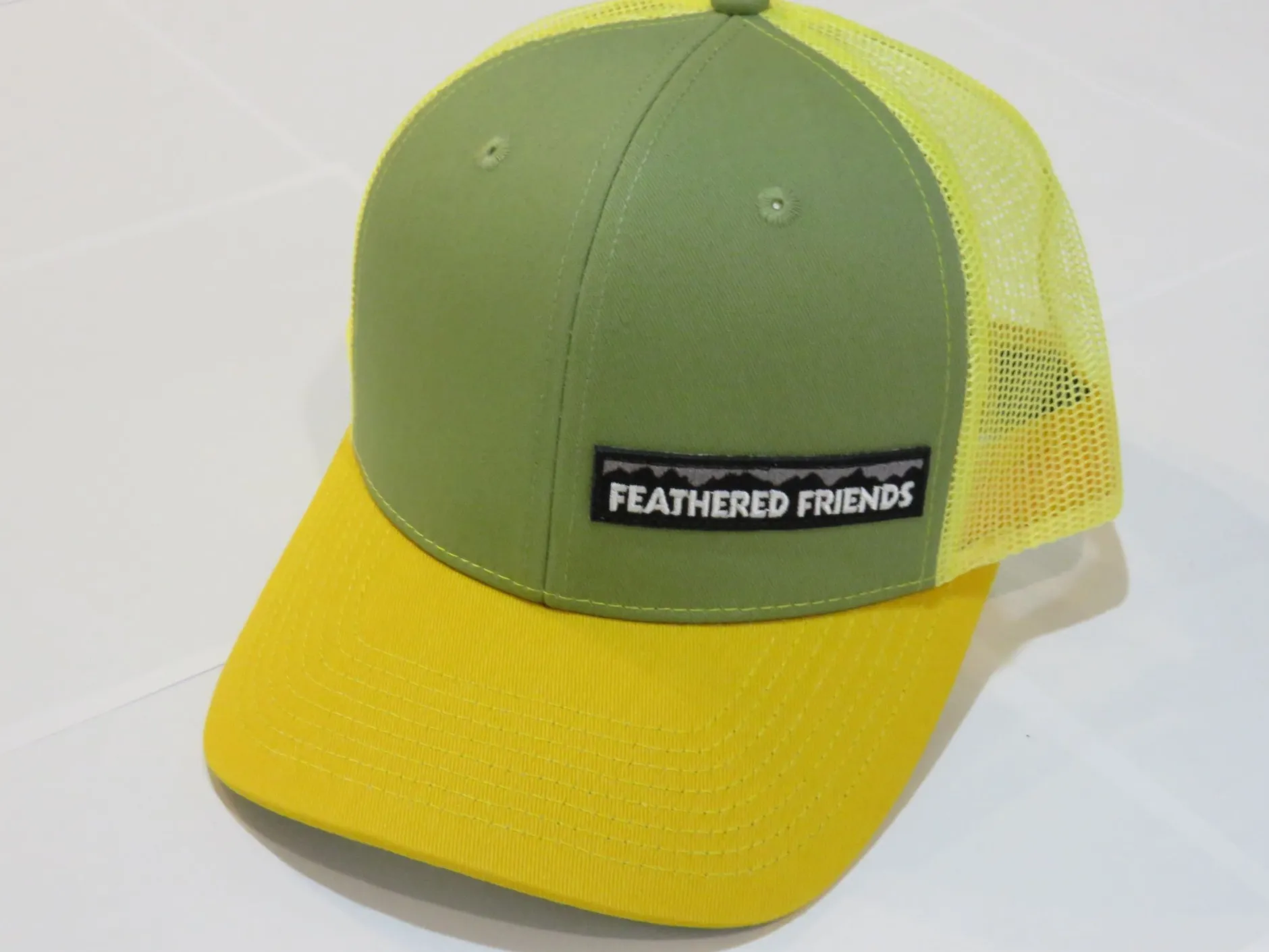 Feathered Friends Pro Style Trucker Offset Mountain Logo Patch Hat