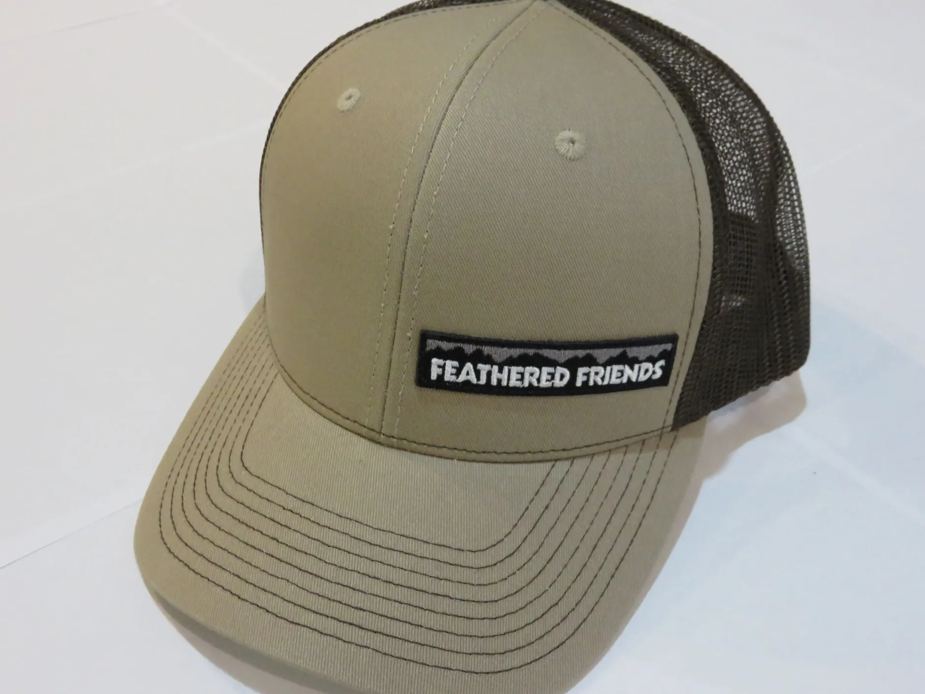 Feathered Friends Pro Style Trucker Offset Mountain Logo Patch Hat
