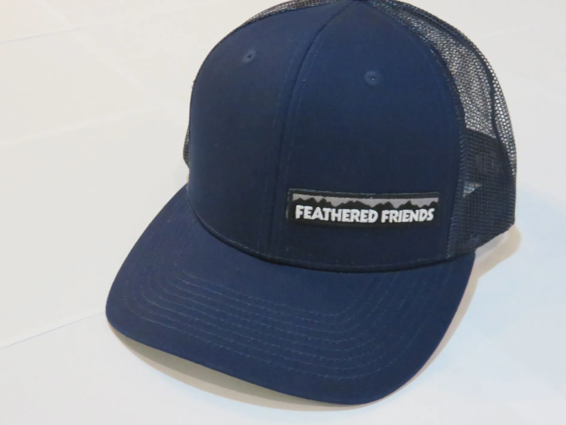 Feathered Friends Pro Style Trucker Offset Mountain Logo Patch Hat